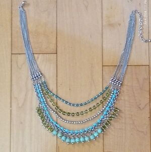 Multi tiered boho beaded chain link necklace with beaded detail